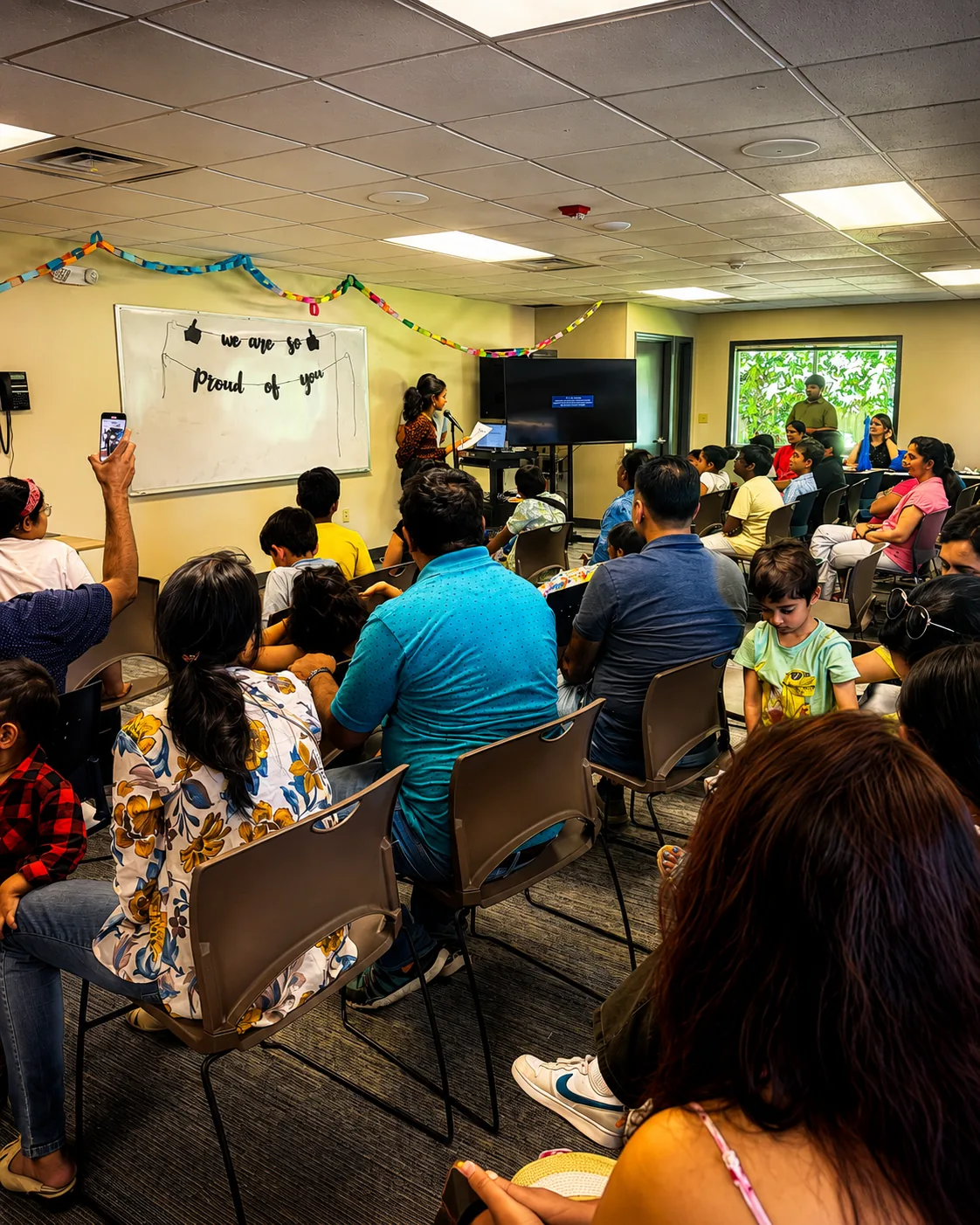 Families and students at a PopSmart Academy student showcase event